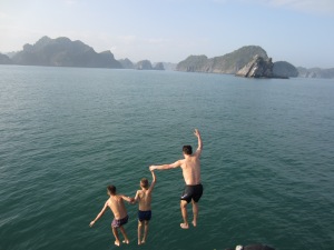 Three boys off a boat, Ha Long Bay