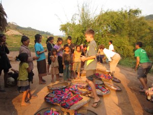 Henry negotiating a price on handmade Lanten satchels