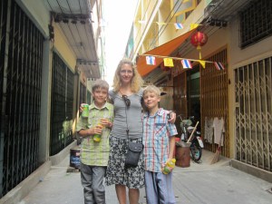 Amy and the boys, random alley, Bangkok, Thailand