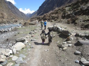 Big book bags, on the way to Mu Gompa